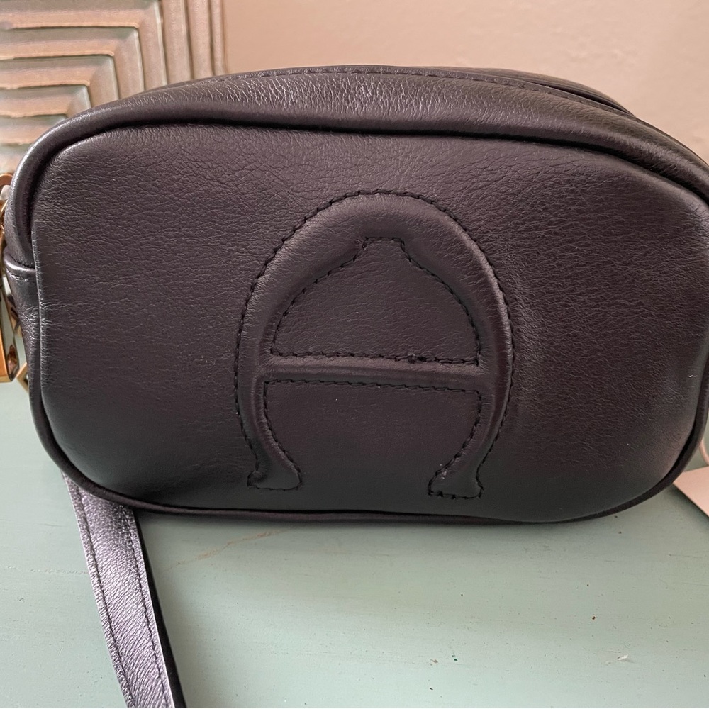 Black, leather, mini crossbody bag.